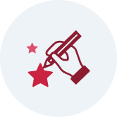 Hand holding a pen drawing red stars on a pale circular badge