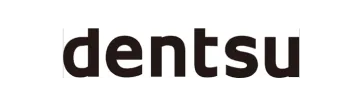 Dentsu logo (wordmark) on white background.